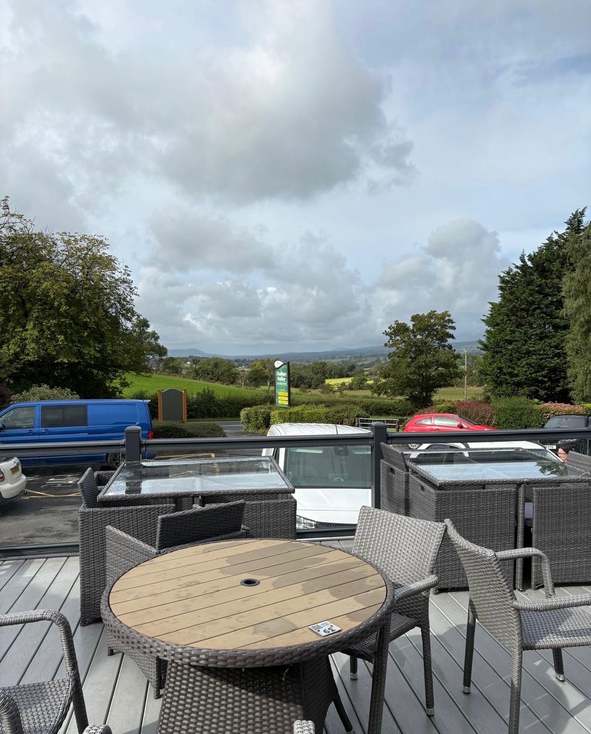 Outdoor seating on the terrace looking out over the valley